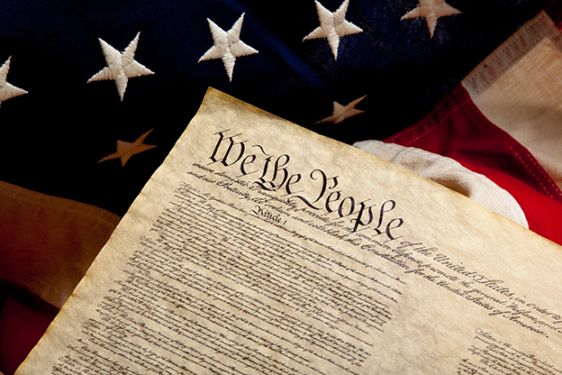Preamble of the Constitution and american flag